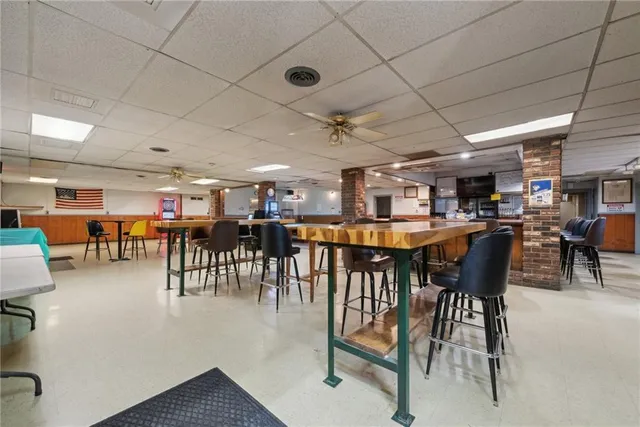 a view of a a dining room with furniture