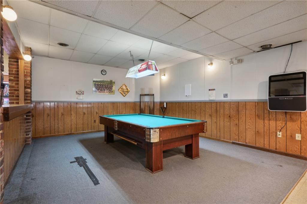 155 Smolleck Street Whitney, PA 15693 - Photo 8 of 39 a room with pool table and flat screen tv
