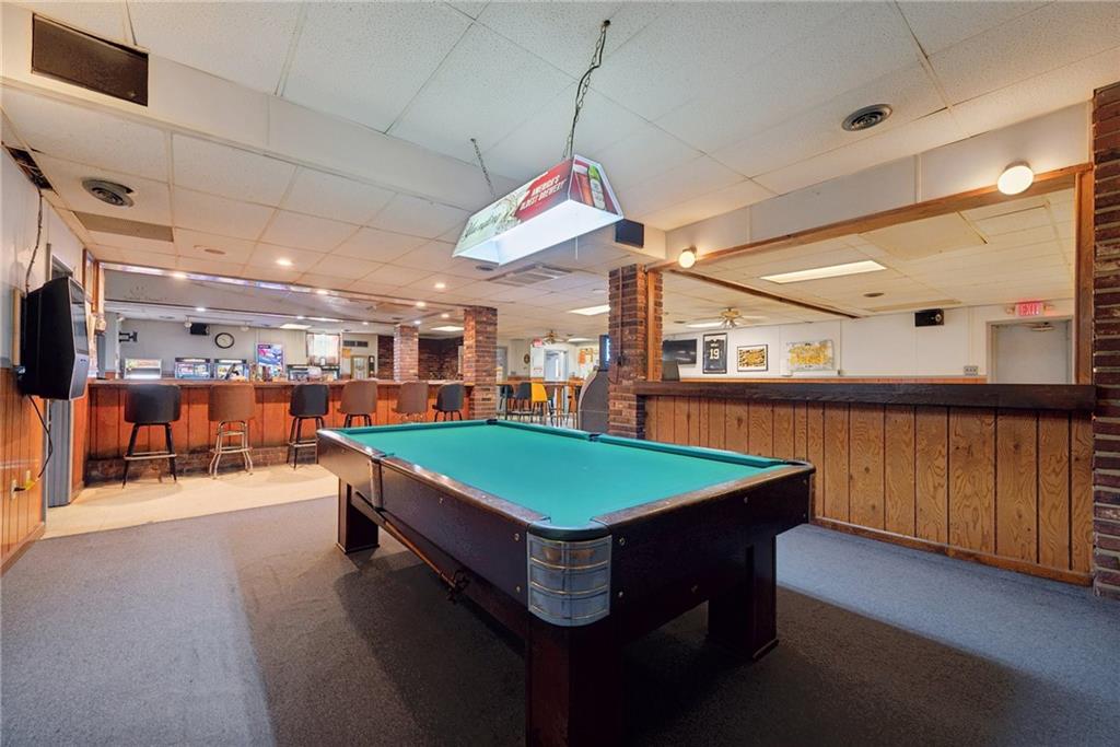 155 Smolleck Street Whitney, PA 15693 - Photo 9 of 39 a room with pool table and flat screen tv