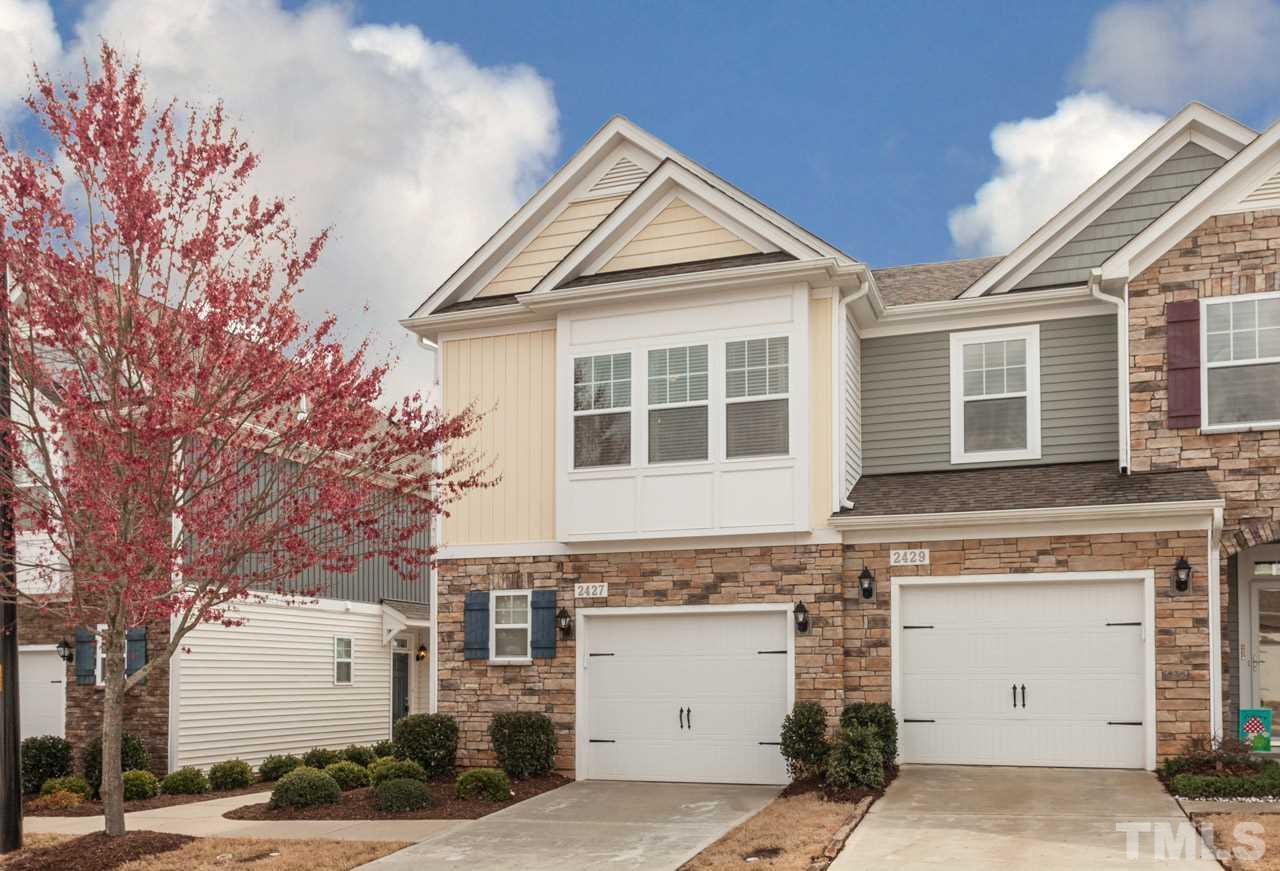 2427 Memory Ridge Drive Raleigh, NC 27606 - Photo 1 of 22 a view of a house with a yard