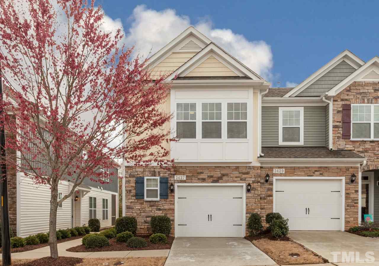 2427 Memory Ridge Drive Raleigh, NC 27606 - Photo 2 of 22 a front view of a house with a yard