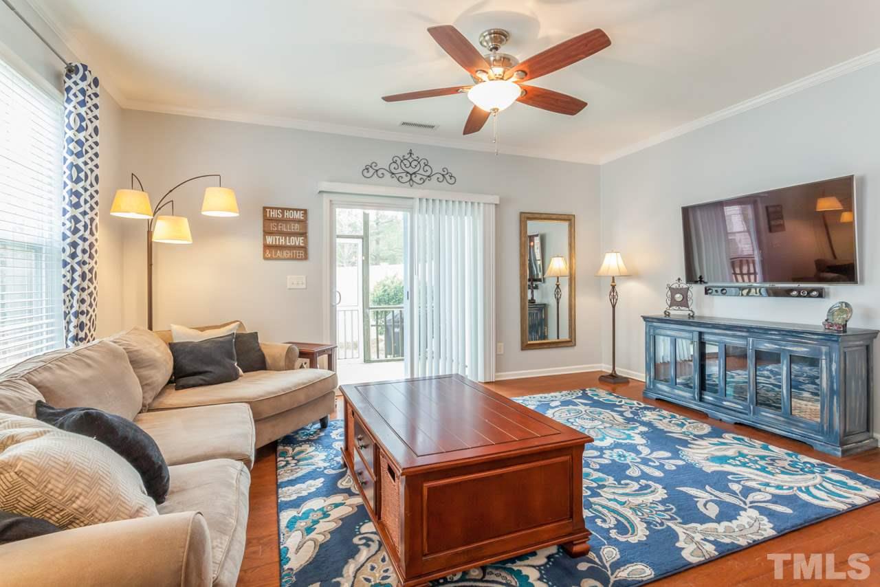 2427 Memory Ridge Drive Raleigh, NC 27606 - Photo 5 of 22 a living room with furniture and a flat screen tv