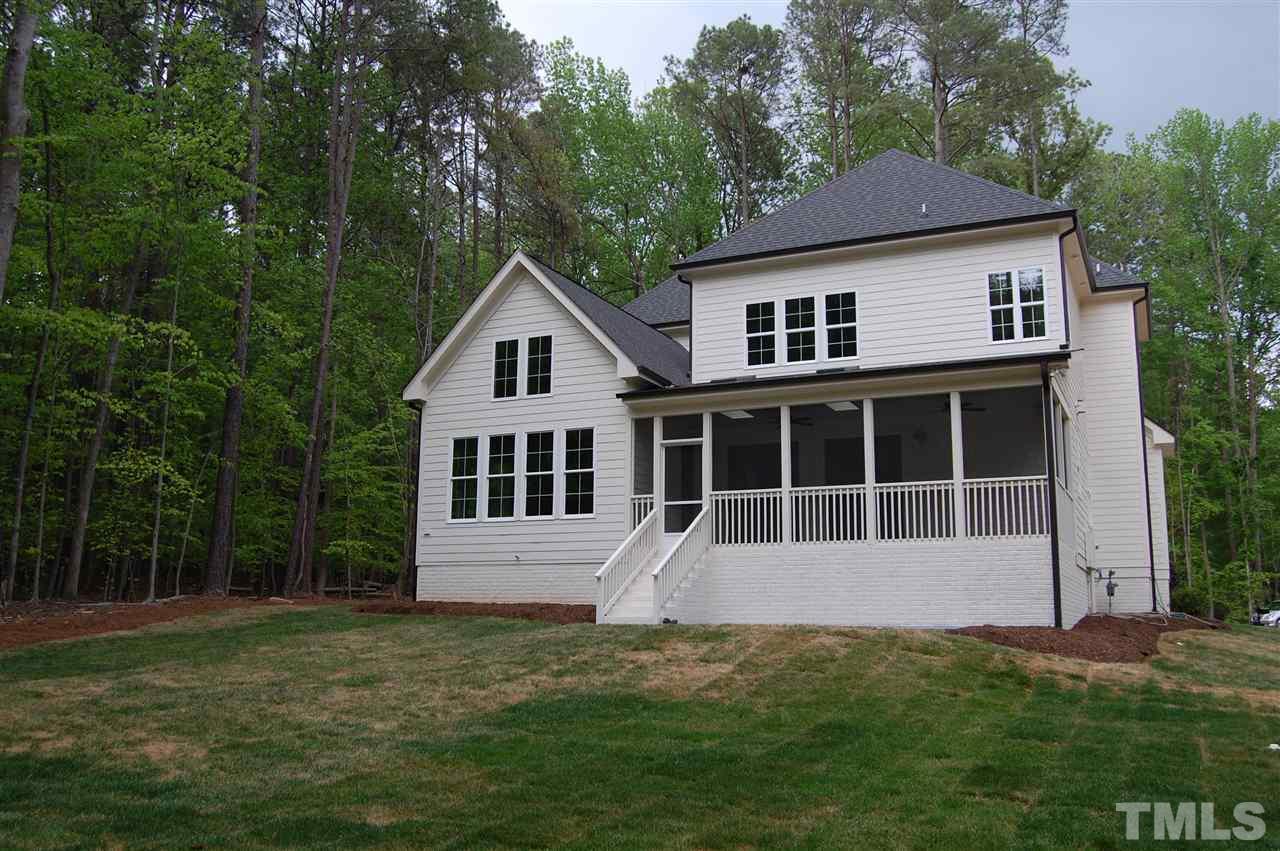 8715 Duckview Court Raleigh, NC 27613 - Photo 3 of 3 a front view of a house with a garden
