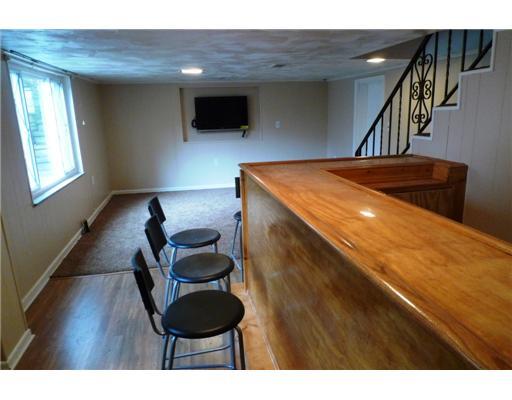 1314 Washington Road Mt. Lebanon, PA 15228 - Photo 14 of 15 Family Room. Family Room with bar and flat screen TV.
