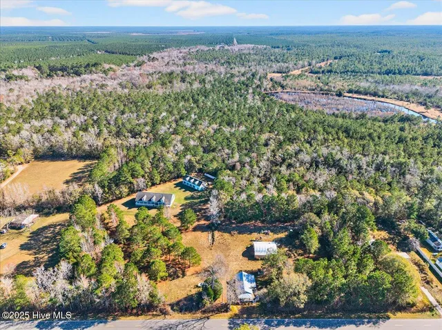 $395,000 | 1986 Big Neck Road Northwest, Ash, NC 28420