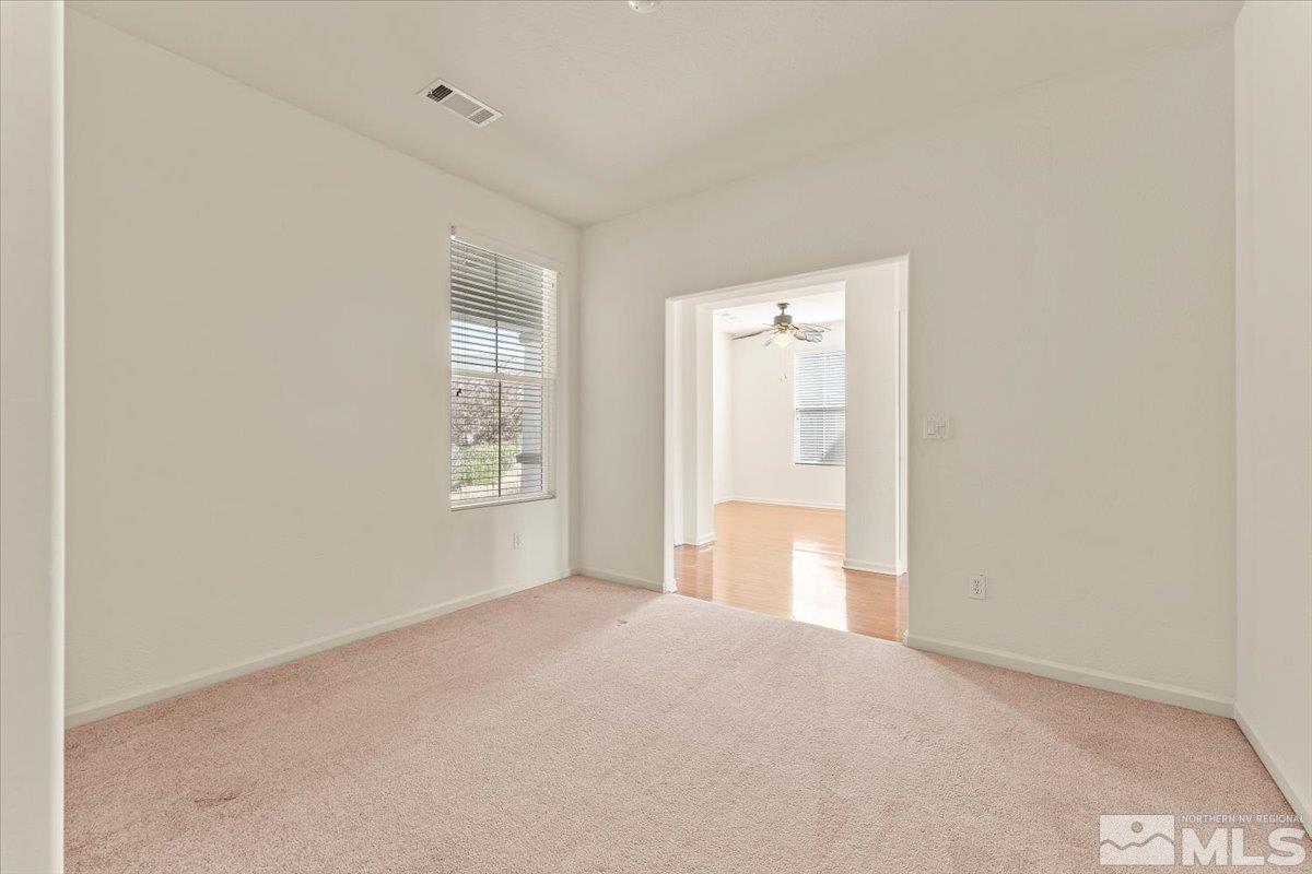 1125 Cliff Park Way Reno, NV 89523 - Photo 17 of 40 a view of an empty room with a window