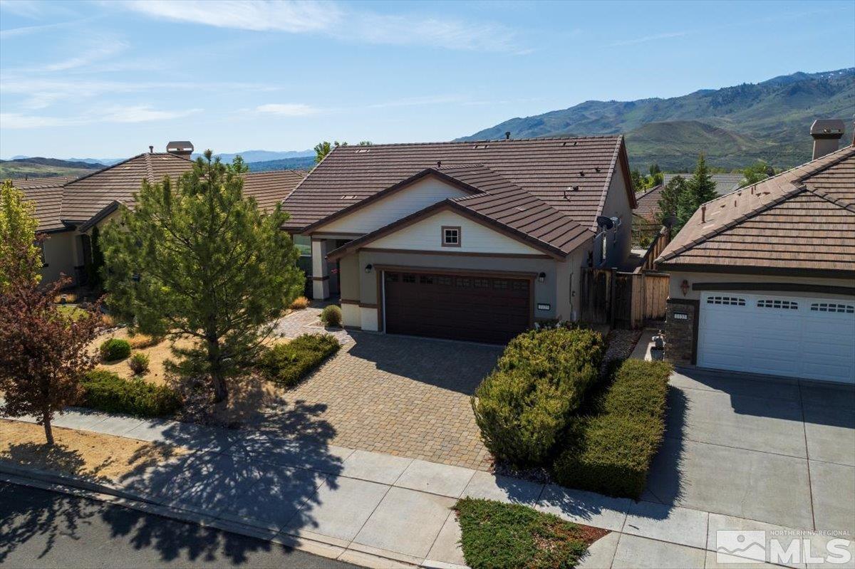 1125 Cliff Park Way Reno, NV 89523 - Photo 32 of 40 a front view of a house with a garden