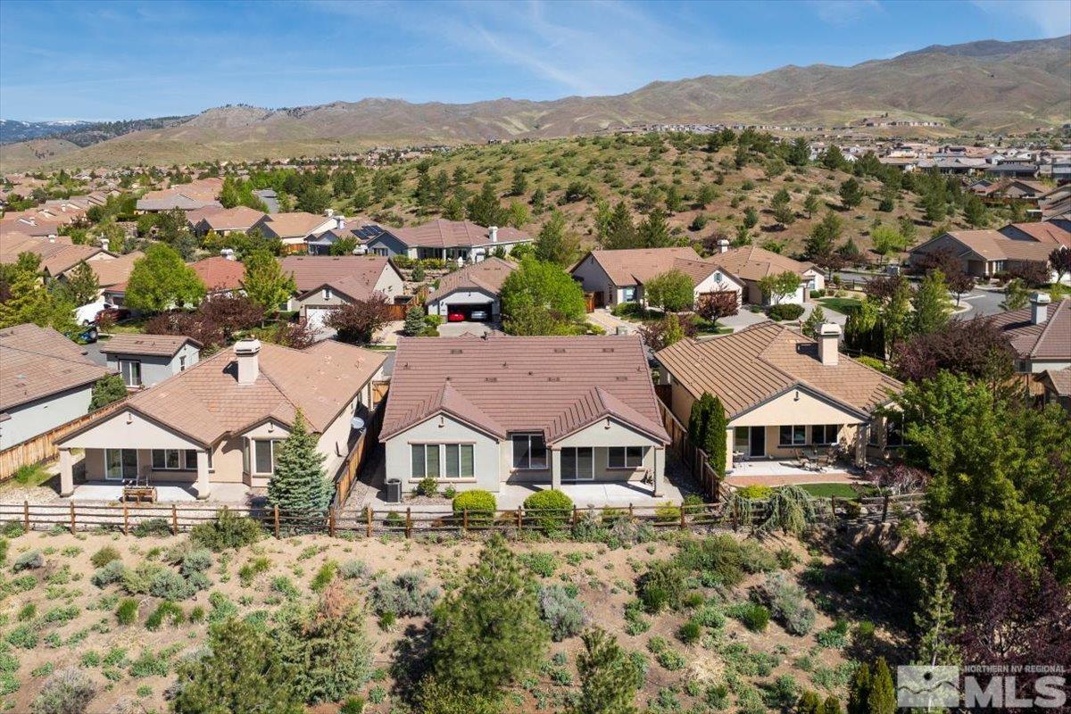 1125 Cliff Park Way Reno, NV 89523 - Photo 34 of 40 an aerial view of residential houses with a city view