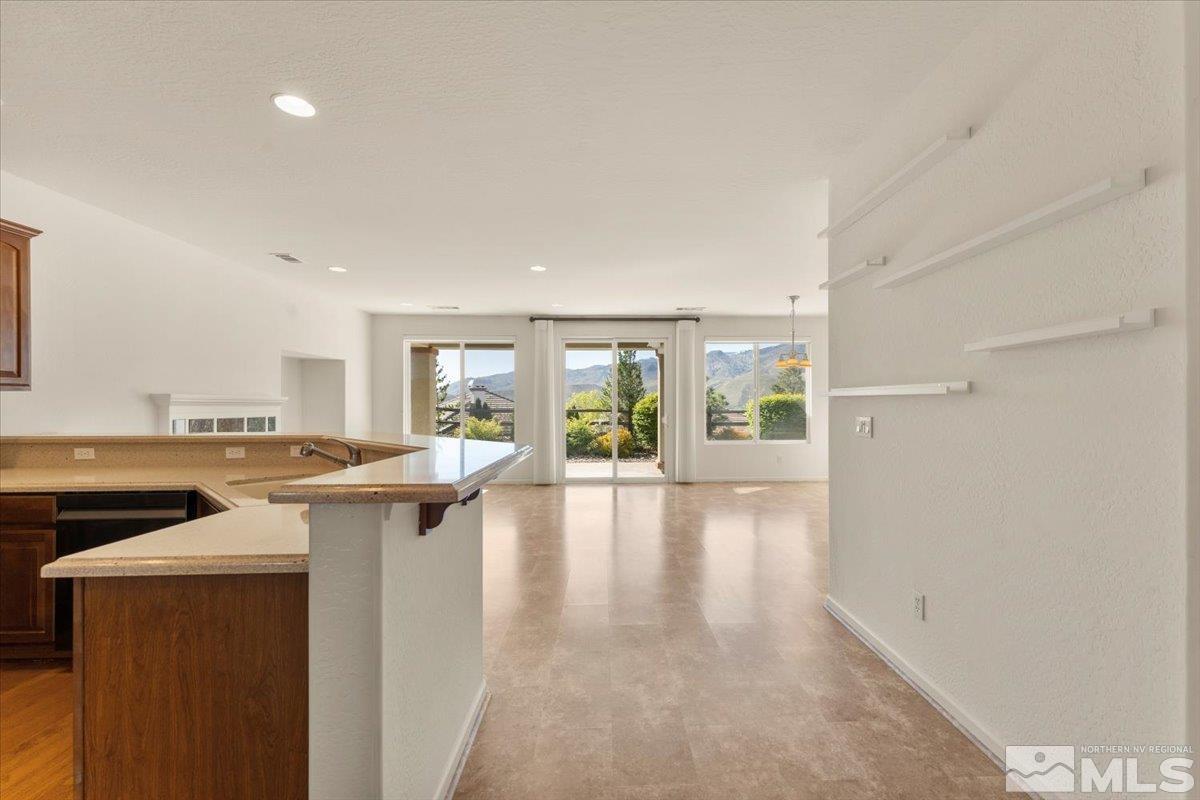 1125 Cliff Park Way Reno, NV 89523 - Photo 4 of 40 a view of a kitchen with a sink and a large window