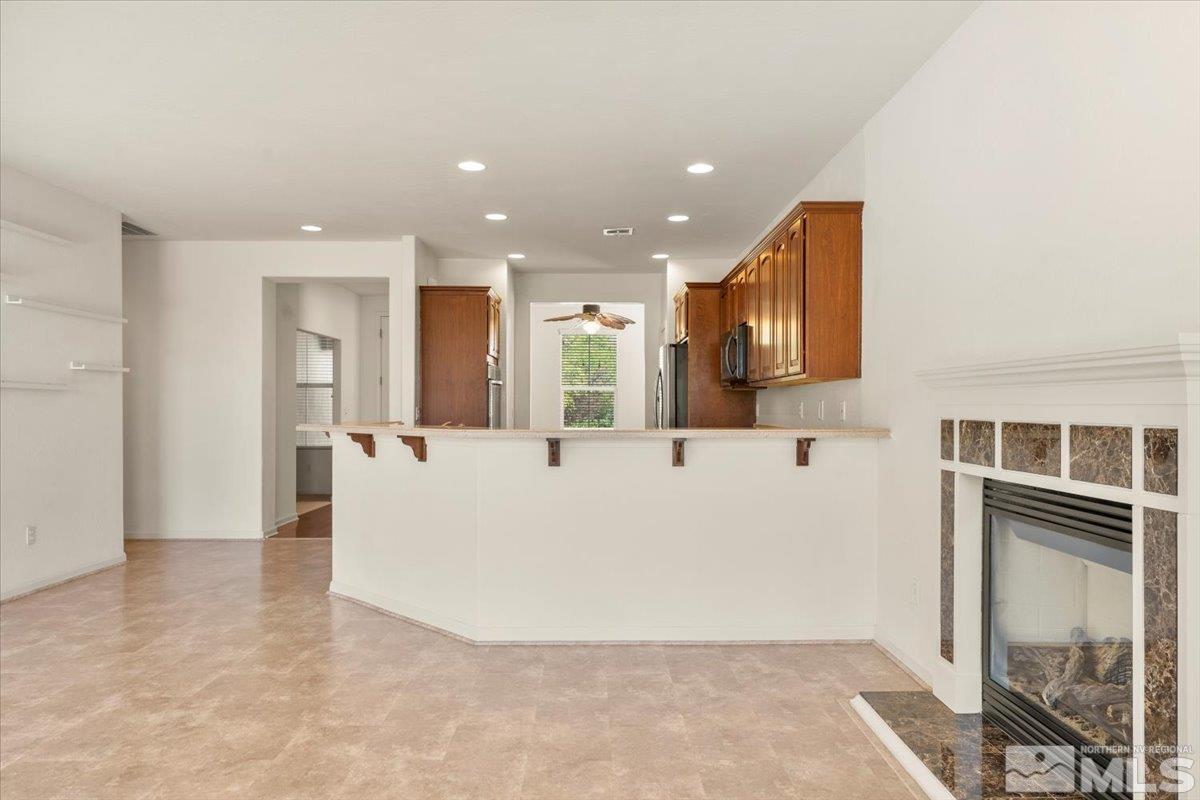 1125 Cliff Park Way Reno, NV 89523 - Photo 10 of 40 a view of kitchen with furniture and refrigerator