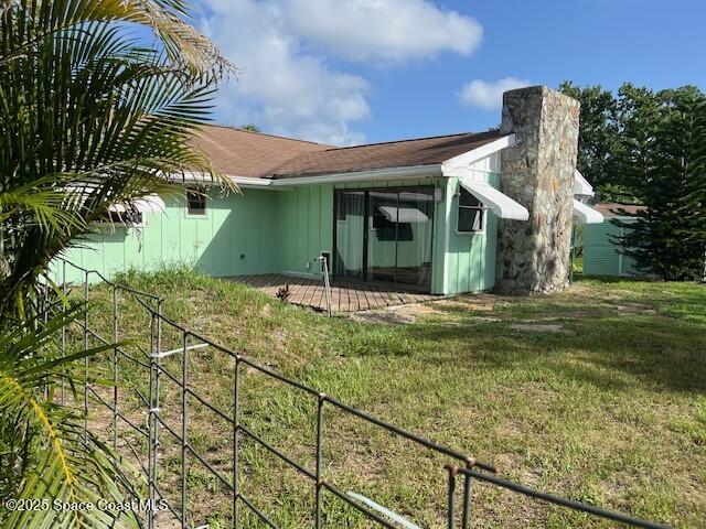 589 Michael Street Sebastian, FL 32958 - Photo 23 of 36 a view of a house with a yard