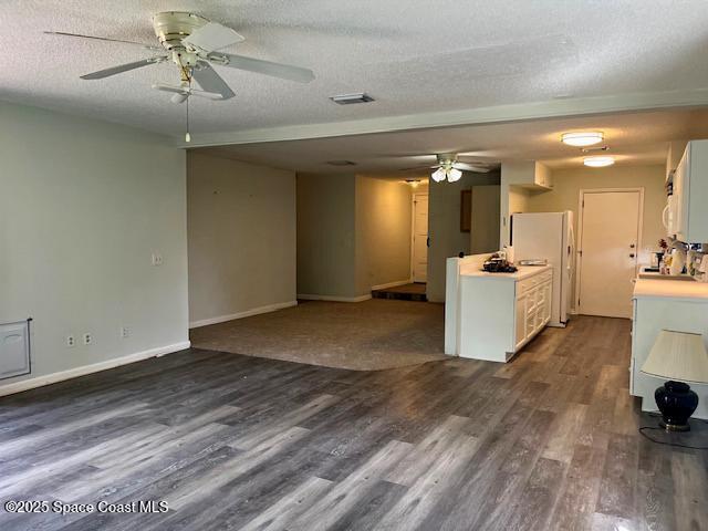 589 Michael Street Sebastian, FL 32958 - Photo 6 of 36 a view of a livingroom with a fireplace a ceiling fan and wooden floor