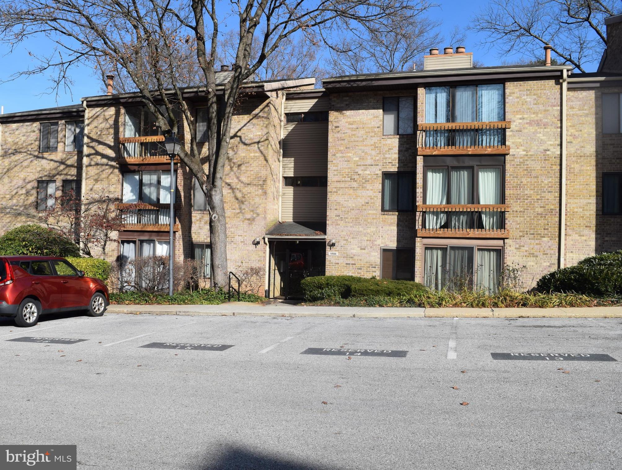 a front view of a building with a street