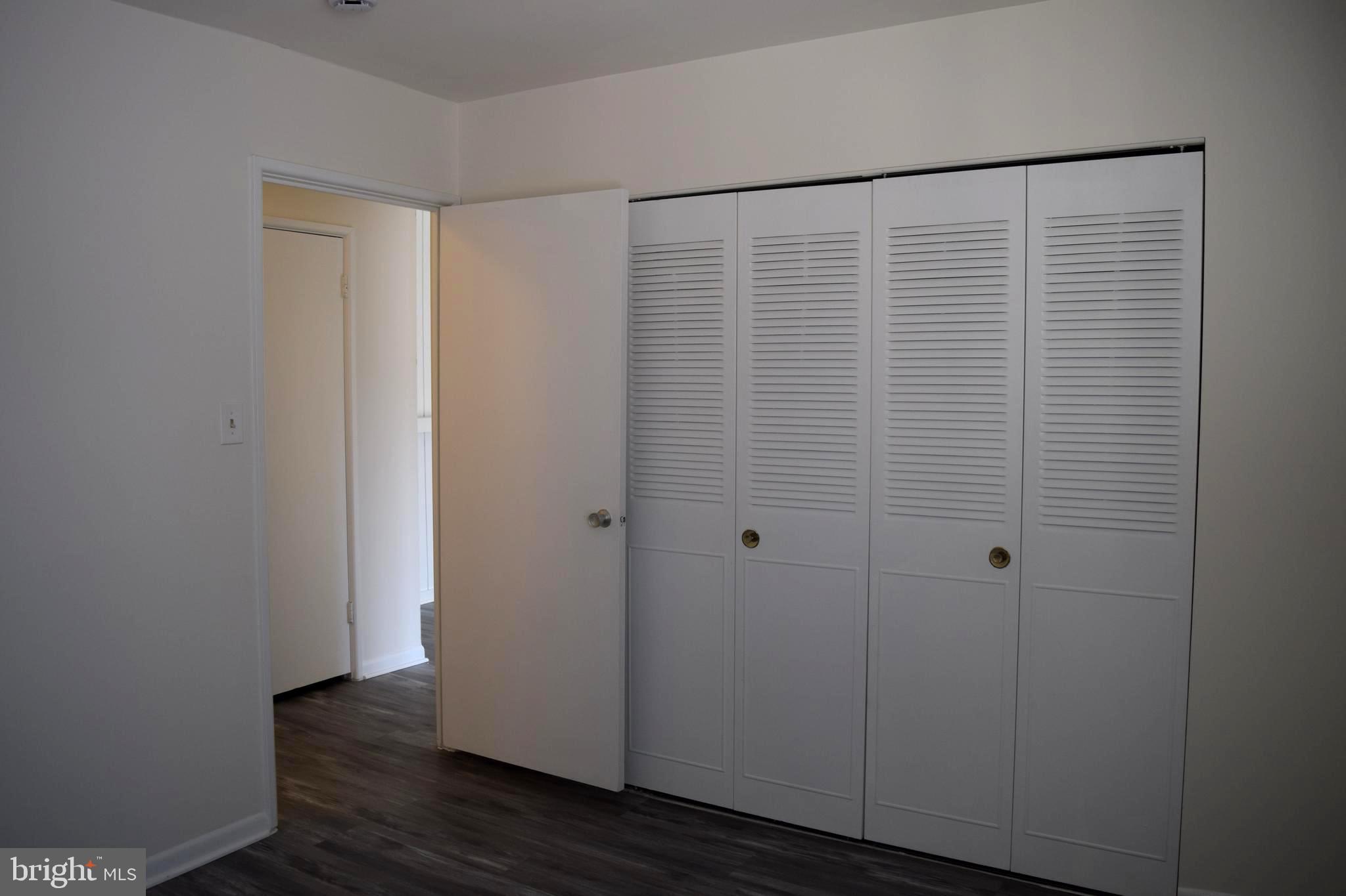 10566 Twin Rivers Road, Unit F1 Columbia, MD 21044 - Photo 17 of 44 a view of small space with wooden floor