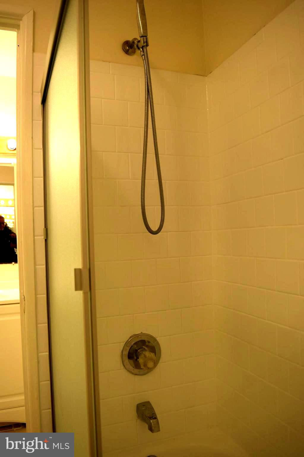 10566 Twin Rivers Road, Unit F1 Columbia, MD 21044 - Photo 23 of 44 a bathroom with a shower