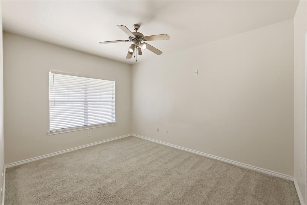3102 Kings Road, Unit 2212 Dallas, TX 75219 - Photo 15 of 30 an empty room with a window and a fan