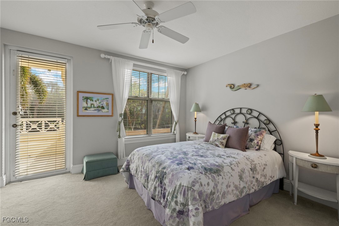 2619 Wulfert Road, Unit 1 Sanibel, FL 33957 - Photo 21 of 35 a bedroom with a bed and a window