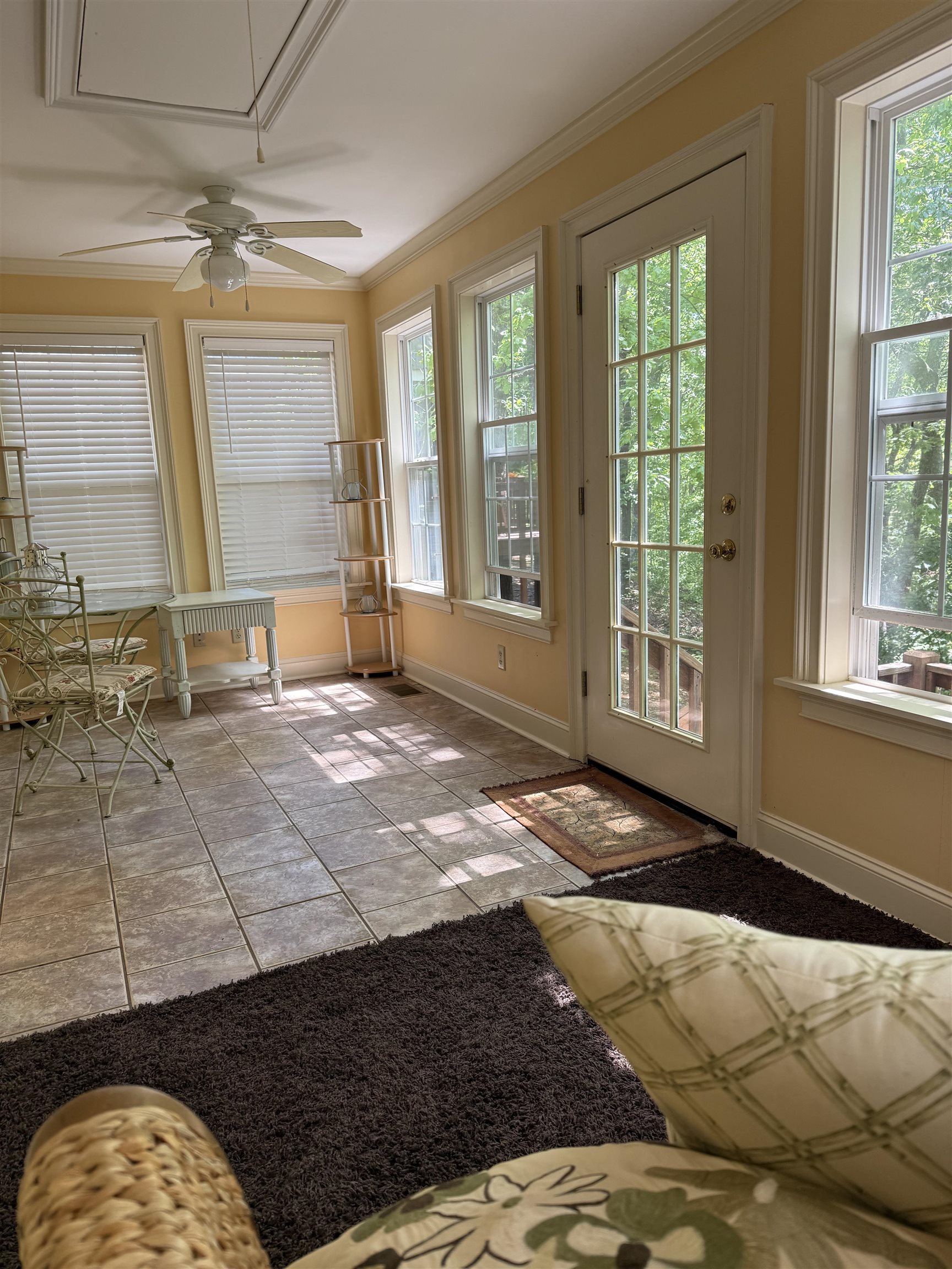 14 Patsy Path Iuka, MS 38852 - Photo 23 of 33 Doorway with ornamental molding, ceiling fan, and baseboards