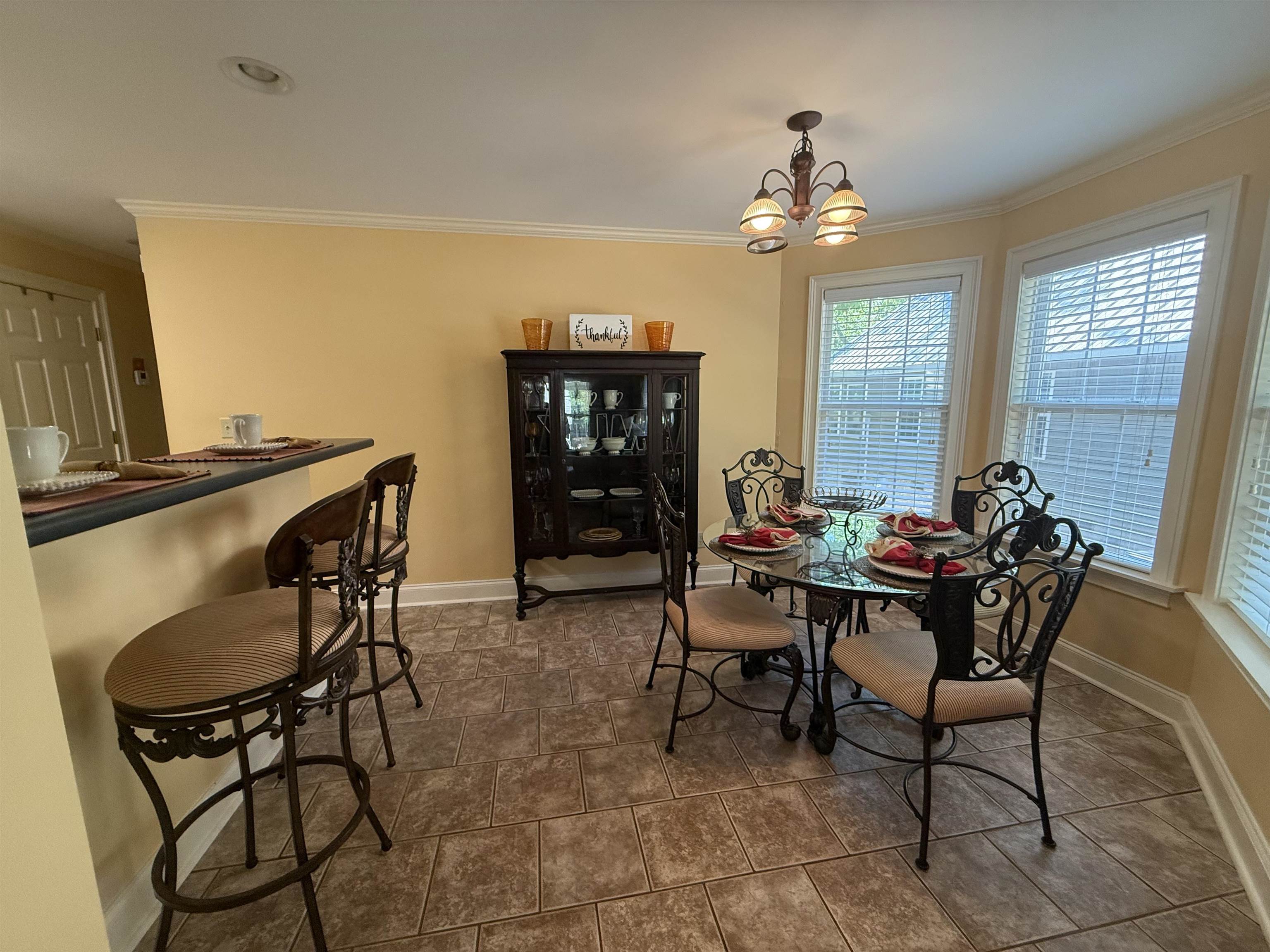 14 Patsy Path Iuka, MS 38852 - Photo 8 of 33 Dining space featuring ornamental molding and a wealth of natural light