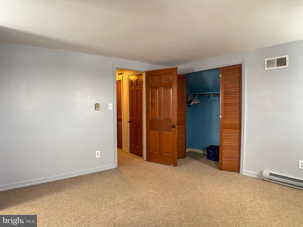 an empty room with closet