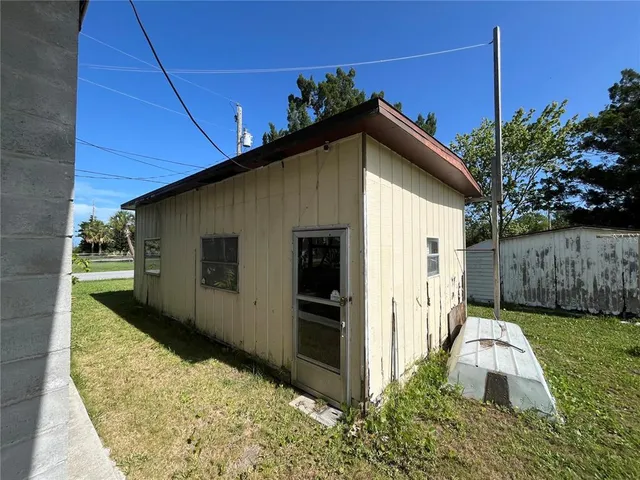 a backyard of a house with lots of green space