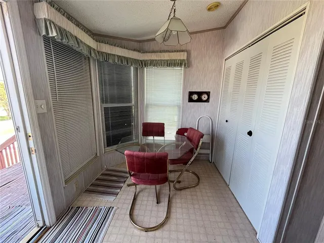 a workspace with furniture and window