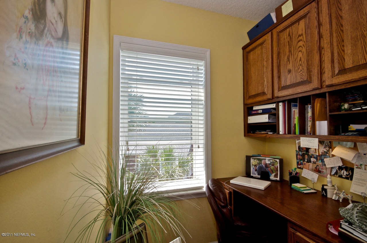 1960 Beach Avenue Atlantic Beach, FL 32233 - Photo 11 of 28 a view of a workspace with furniture and a window