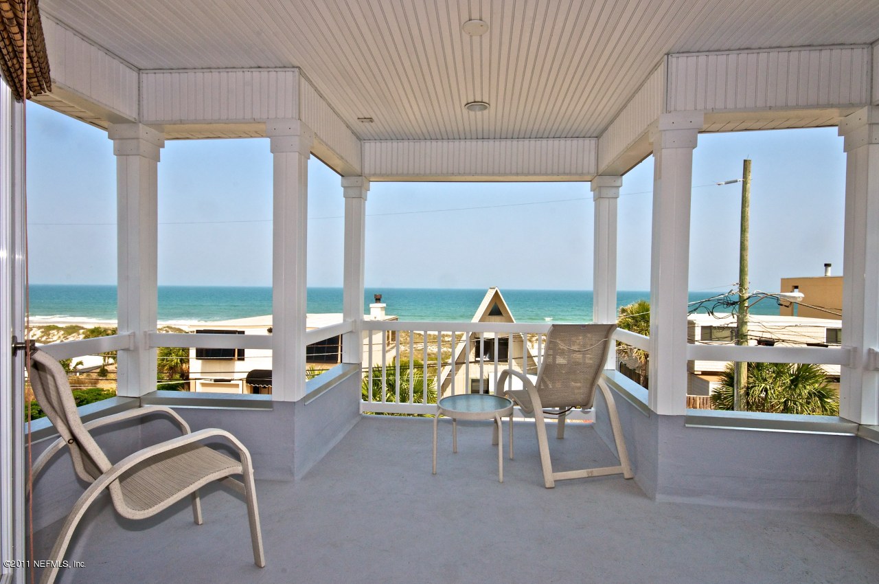 1960 Beach Avenue Atlantic Beach, FL 32233 - Photo 15 of 28 a living room with furniture fireplace and large windows