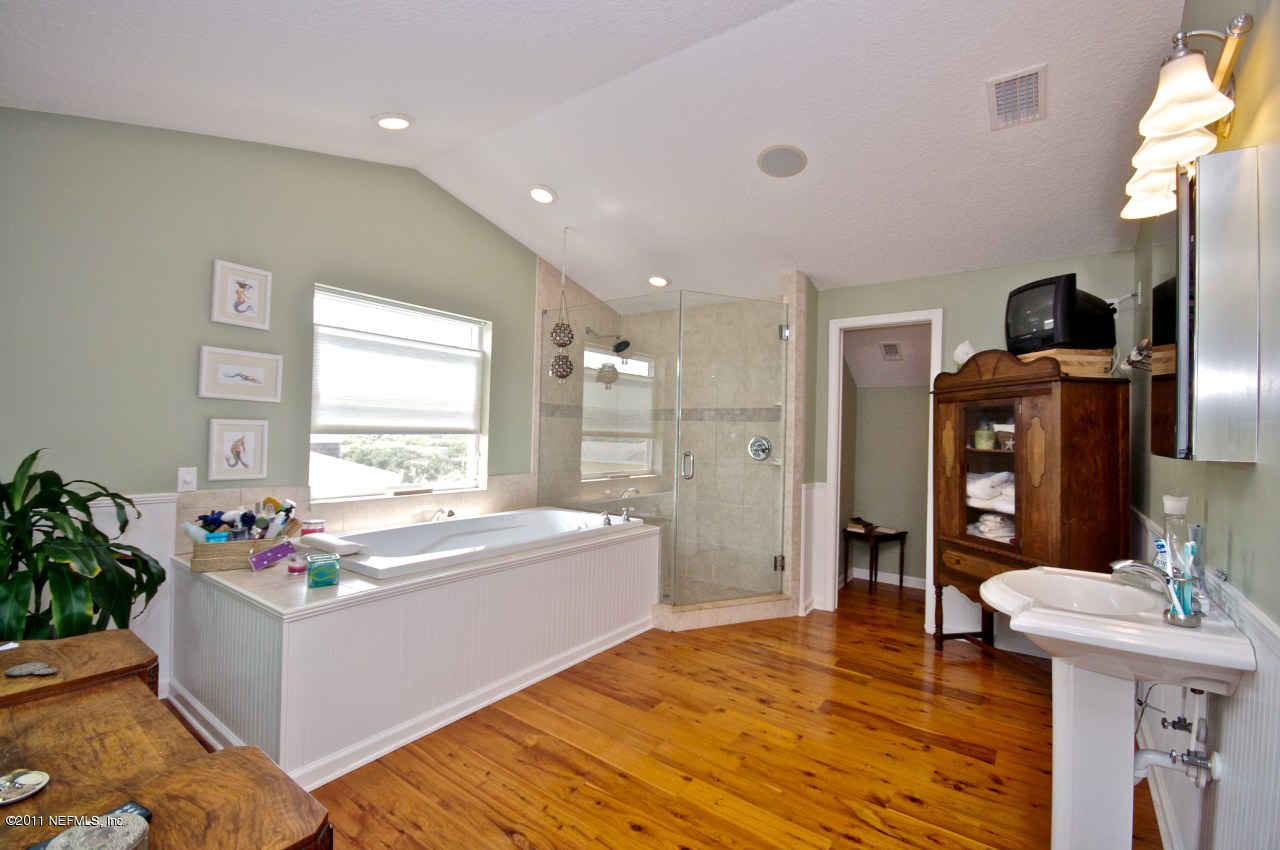 1960 Beach Avenue Atlantic Beach, FL 32233 - Photo 17 of 28 a living room with furniture and a flat screen tv