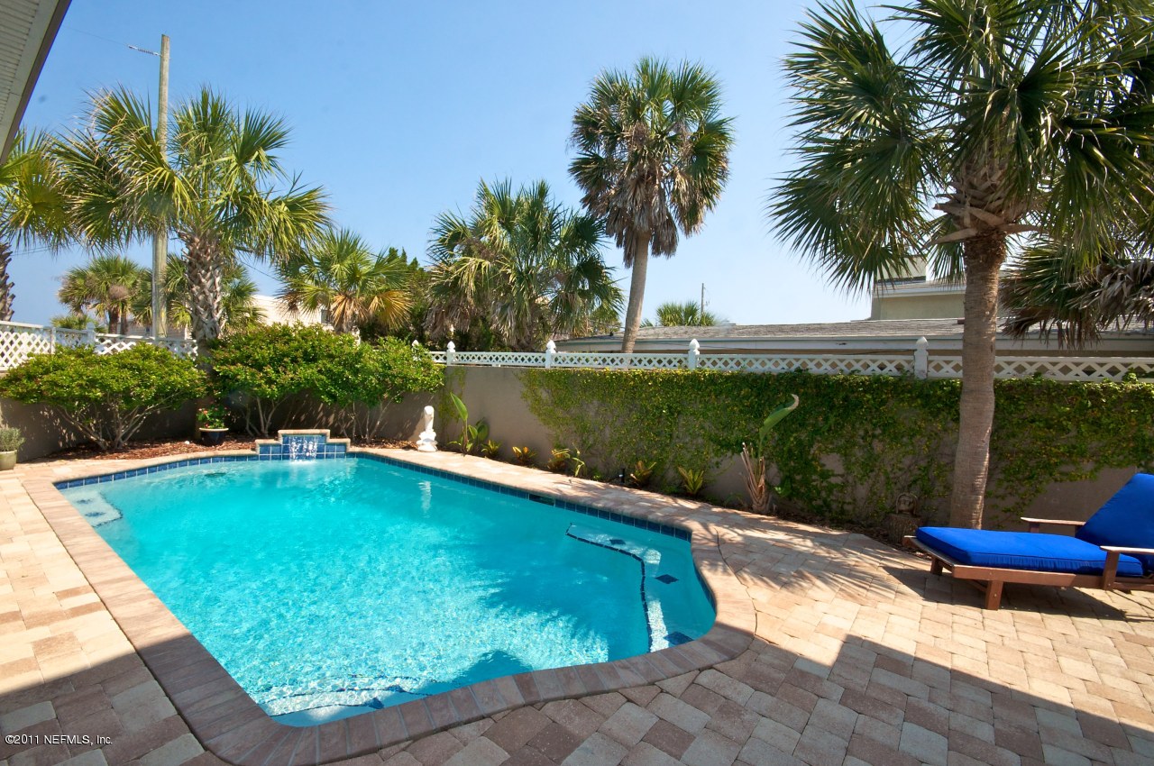 1960 Beach Avenue Atlantic Beach, FL 32233 - Photo 24 of 28 a view of a swimming pool with a yard