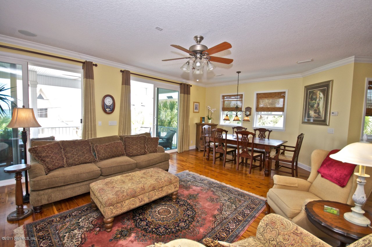 1960 Beach Avenue Atlantic Beach, FL 32233 - Photo 3 of 28 a living room with furniture and a large window