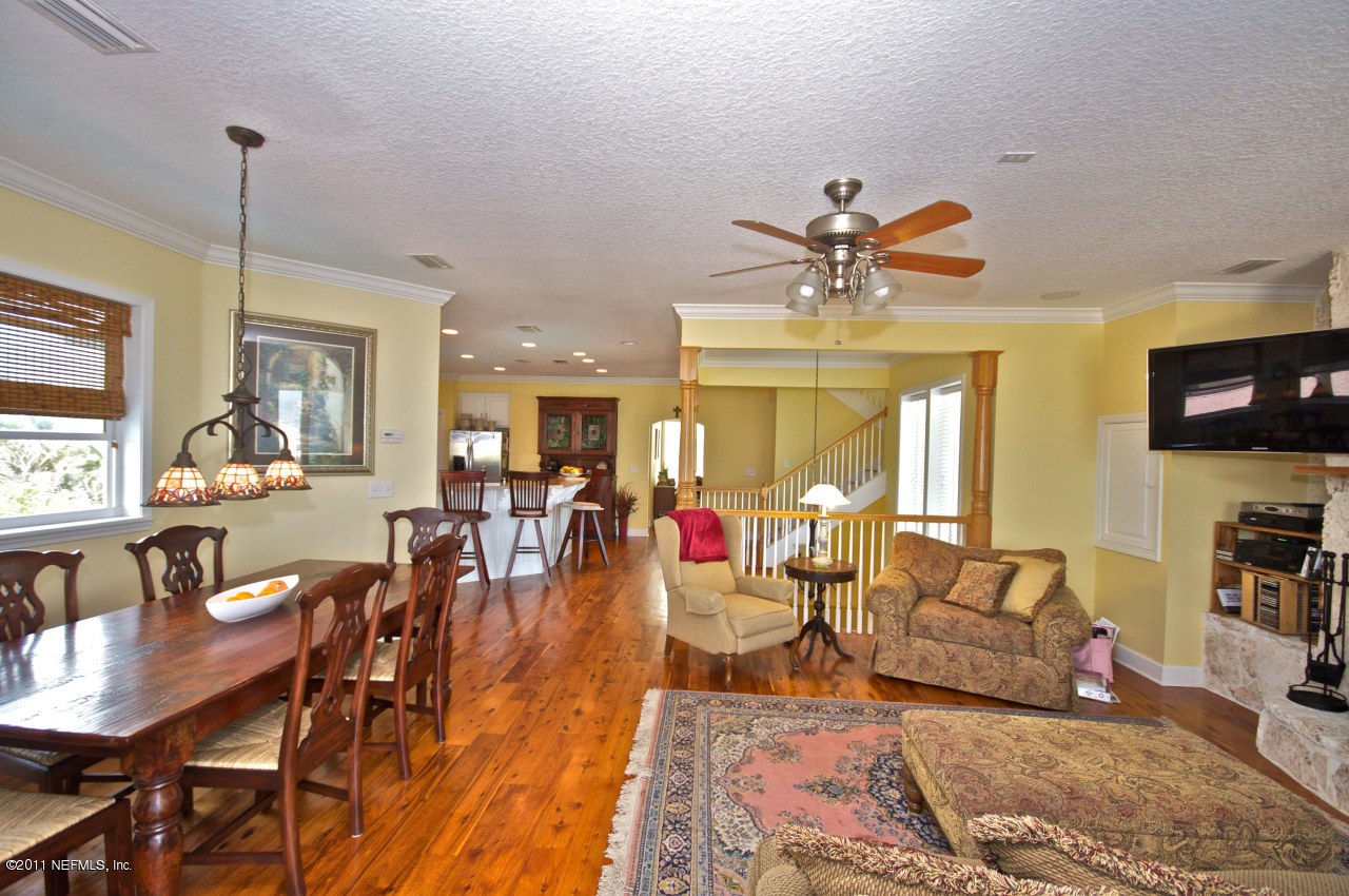 1960 Beach Avenue Atlantic Beach, FL 32233 - Photo 4 of 28 a living room with furniture kitchen view and a large window