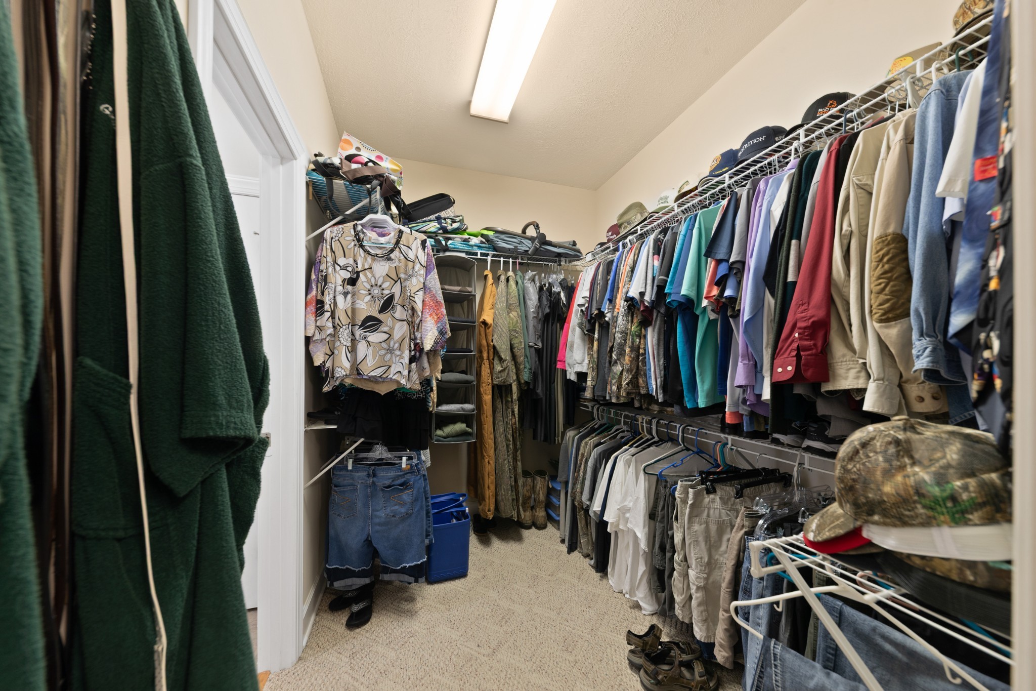1642 Caughran Road Lewisburg, TN 37091 - Photo 36 of 92 a view of walk in closet with clothes and shoes