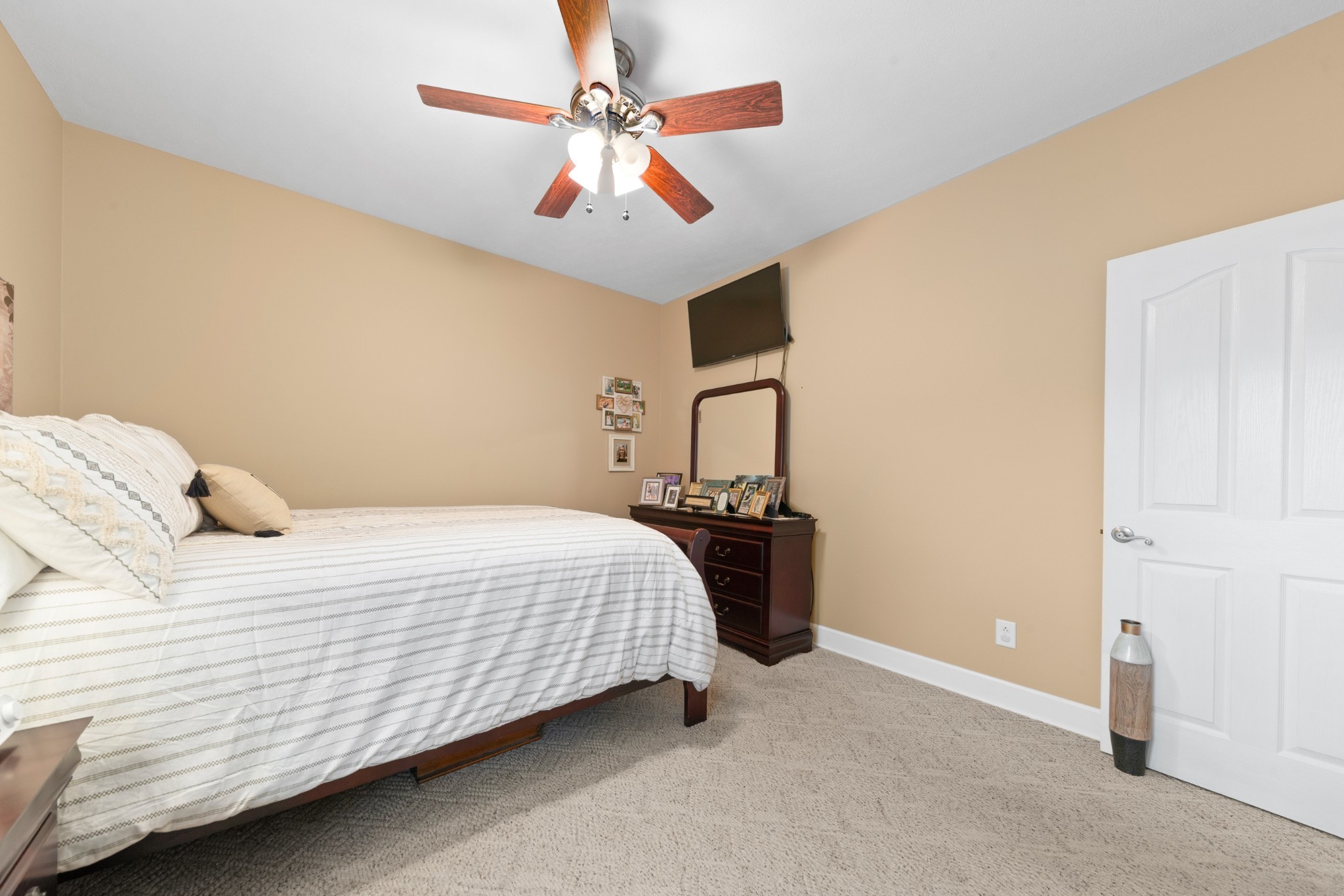 1642 Caughran Road Lewisburg, TN 37091 - Photo 42 of 92 a bedroom with a bed and a ceiling fan
