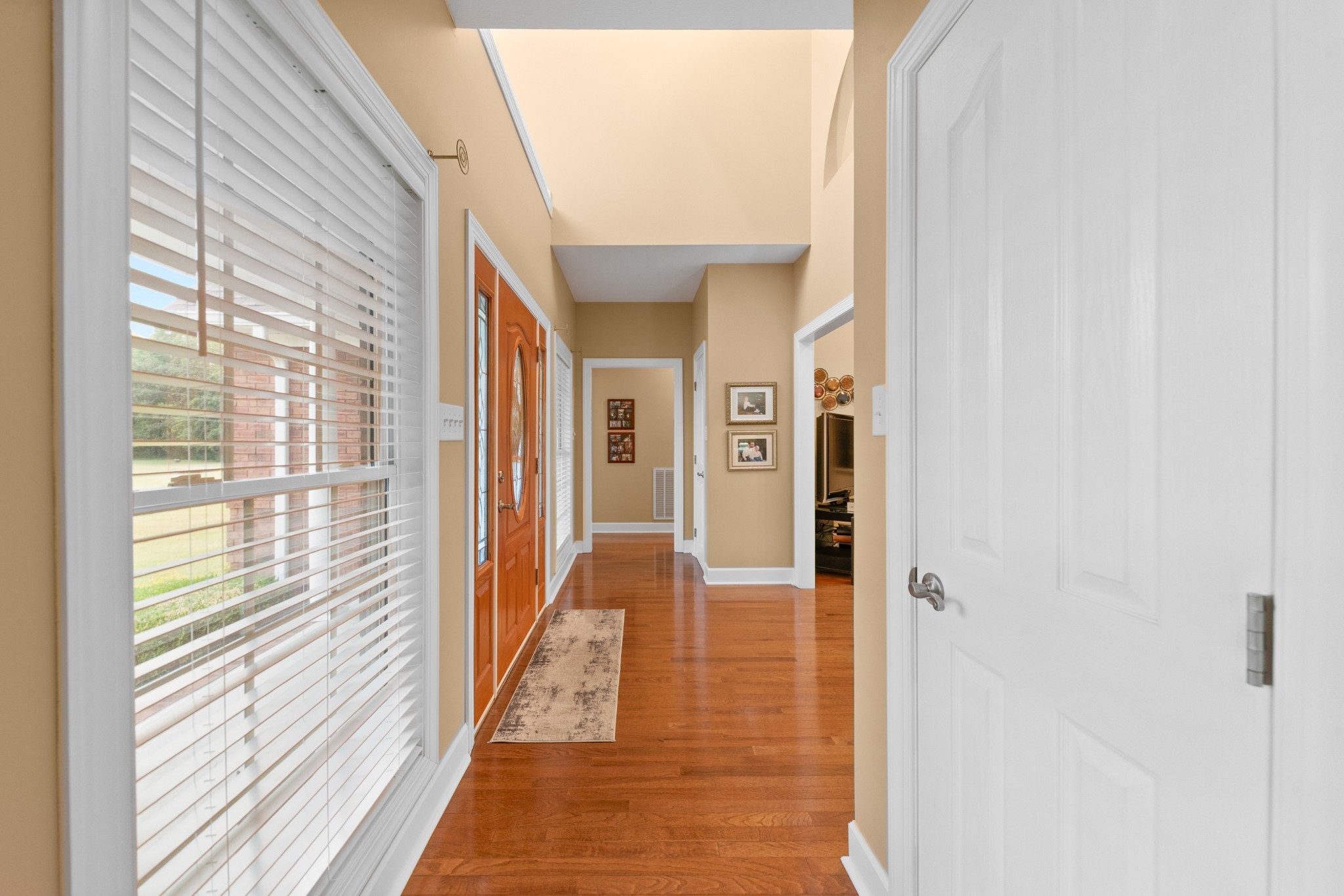 1642 Caughran Road Lewisburg, TN 37091 - Photo 45 of 92 a view of a hallway with wooden floor and staircase