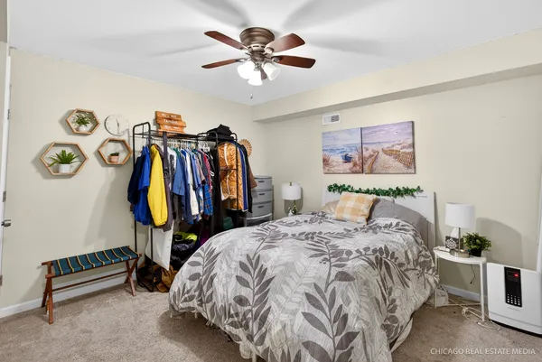 a bed room with a bed and a walk in closet