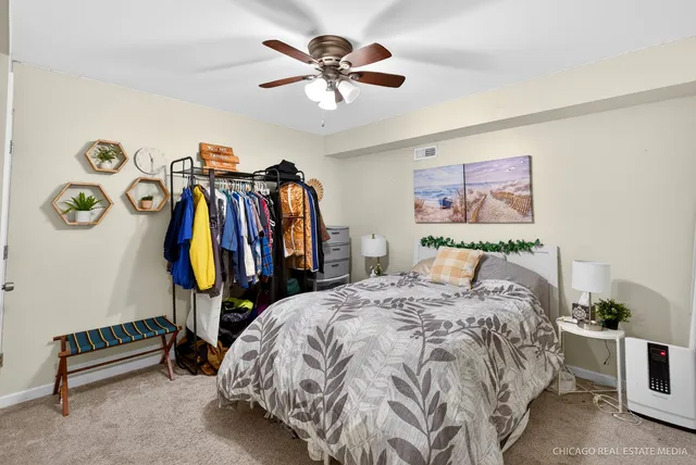 a bed room with a bed and a walk in closet