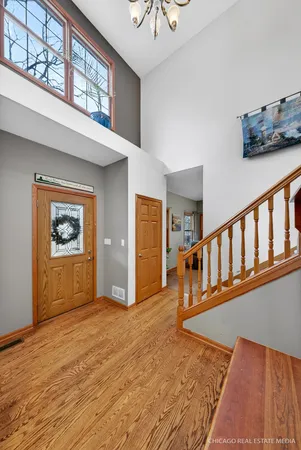 a view of a hallway with an entryway