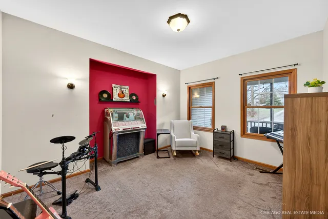 a view of a livingroom with furniture and a window