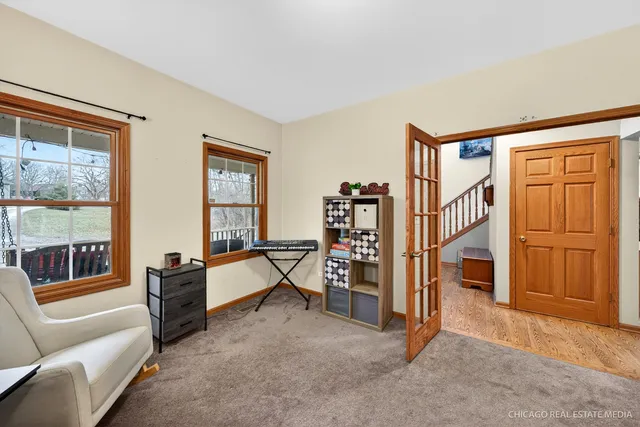 a bedroom with furniture and a window