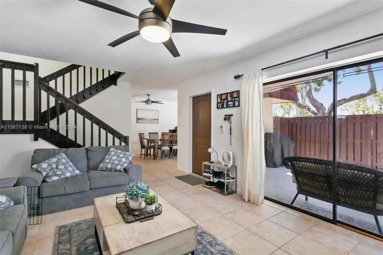 8379 Boca Rio Drive Boca Raton, FL 33433 - Photo 13 of 30 a living room with furniture and wooden floor