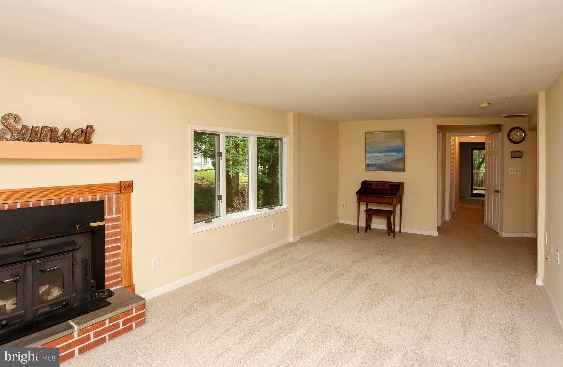 1868 Potomac Road Pasadena, MD 21122 - Photo 21 of 45 Living room with fireplace