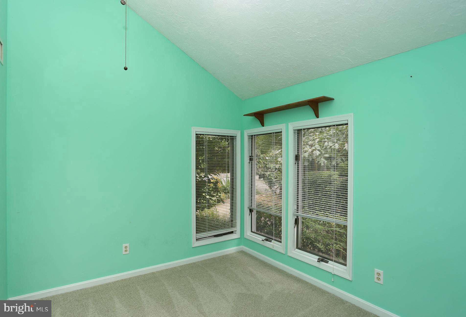 1868 Potomac Road Pasadena, MD 21122 - Photo 29 of 45 Main level bedroom with cathedral ceiling