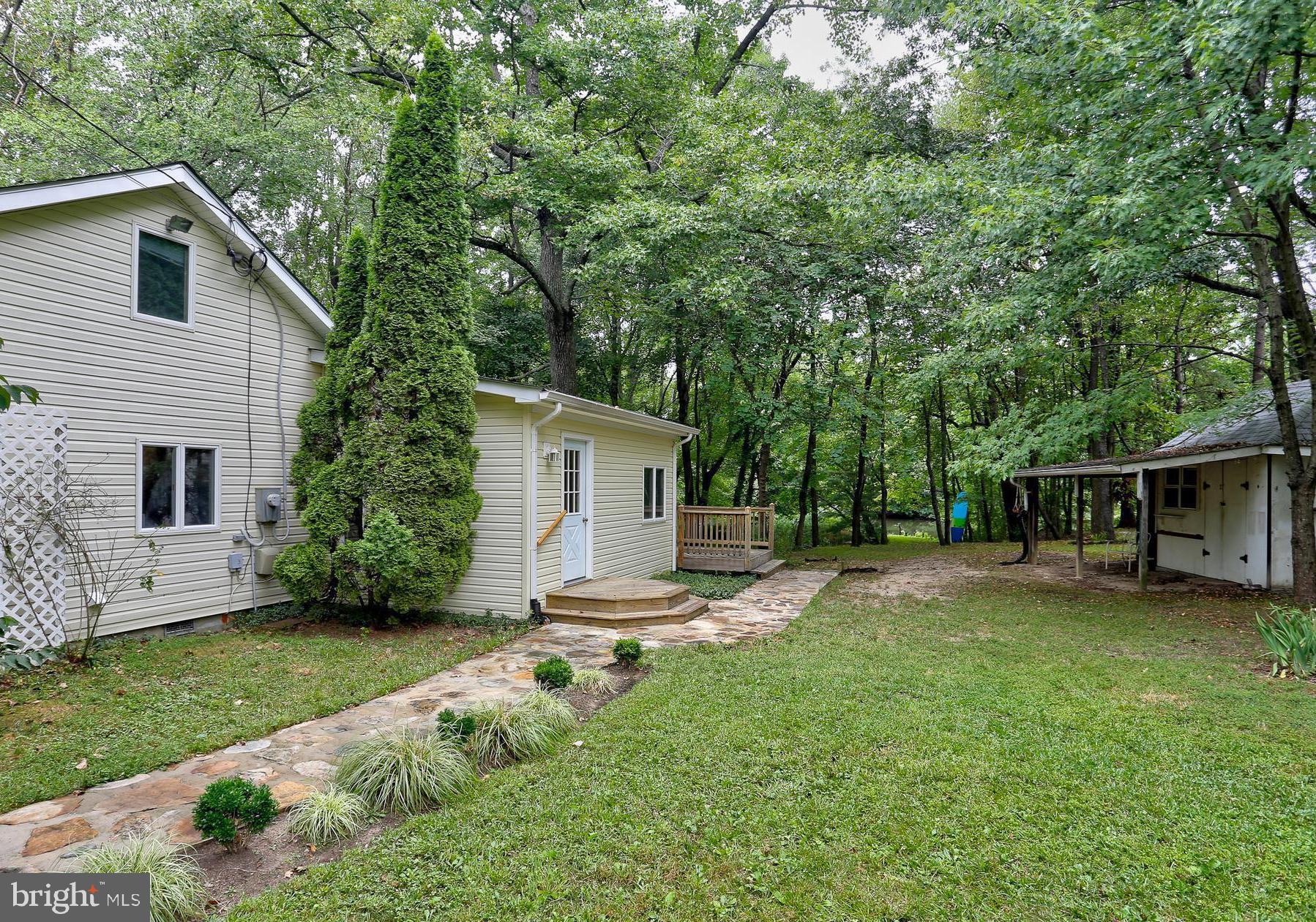 1868 Potomac Road Pasadena, MD 21122 - Photo 39 of 45 Side view of home and shed