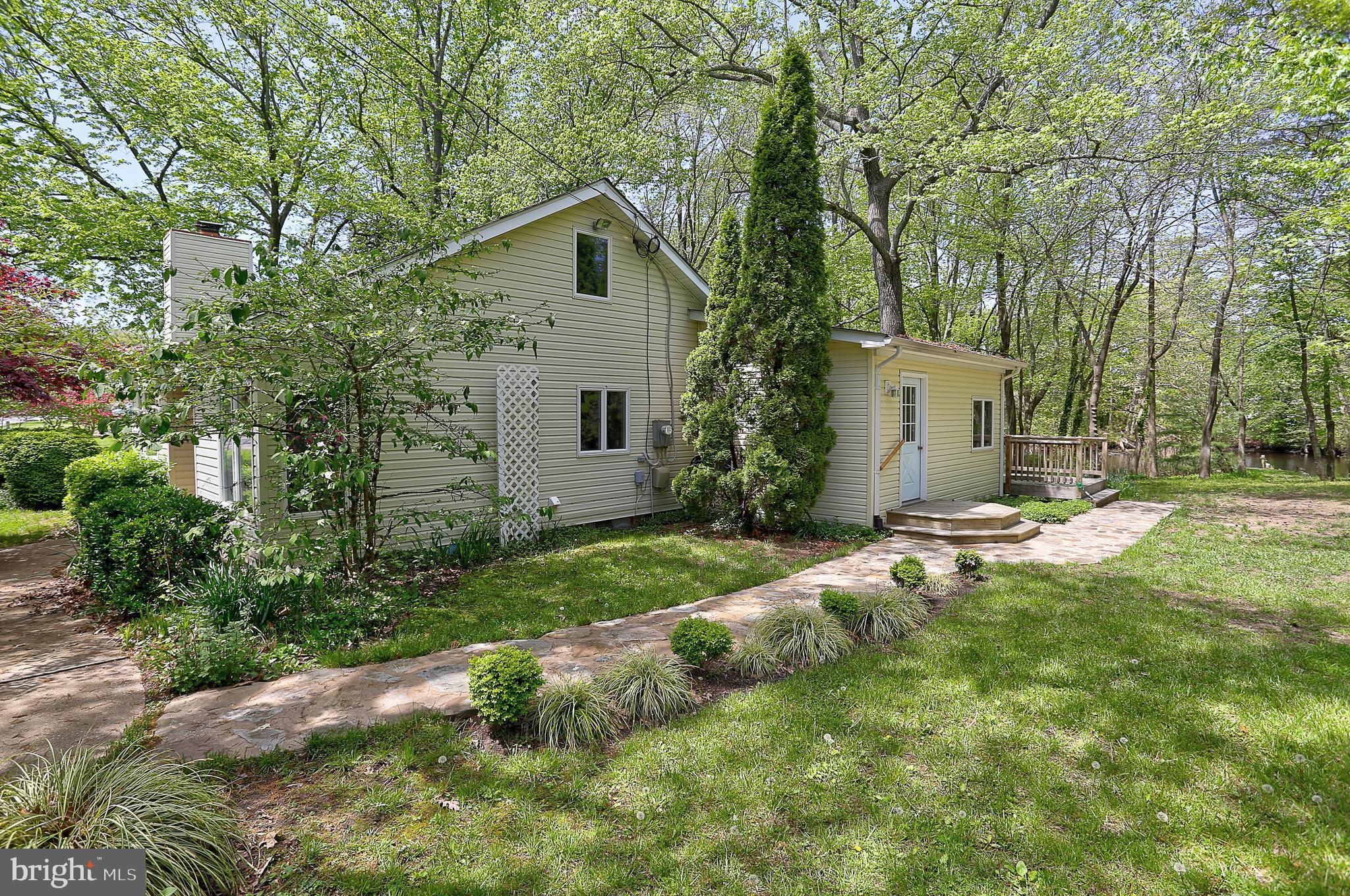 1868 Potomac Road Pasadena, MD 21122 - Photo 6 of 45 Stone walkway to side entry