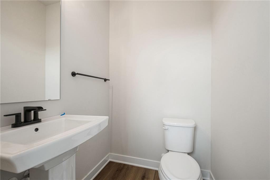 110 Scenic Ridge Drive Venetia, PA 15367 - Photo 13 of 33 a bathroom with a toilet sink and mirror