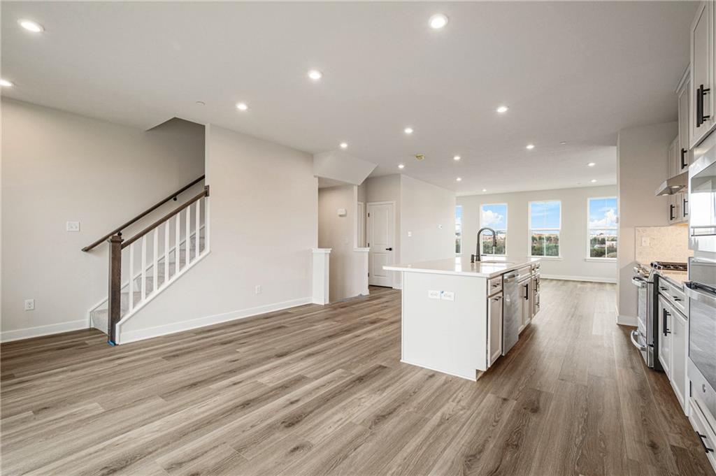 110 Scenic Ridge Drive Venetia, PA 15367 - Photo 20 of 33 a view of a kitchen with wooden floor and a sink