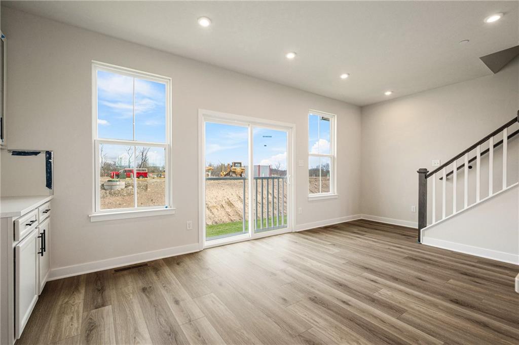 110 Scenic Ridge Drive Venetia, PA 15367 - Photo 21 of 33 a view of an empty room with wooden floor and a window