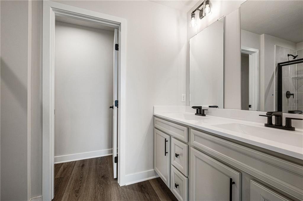 110 Scenic Ridge Drive Venetia, PA 15367 - Photo 30 of 33 a bathroom with a double vanity sink and a mirror