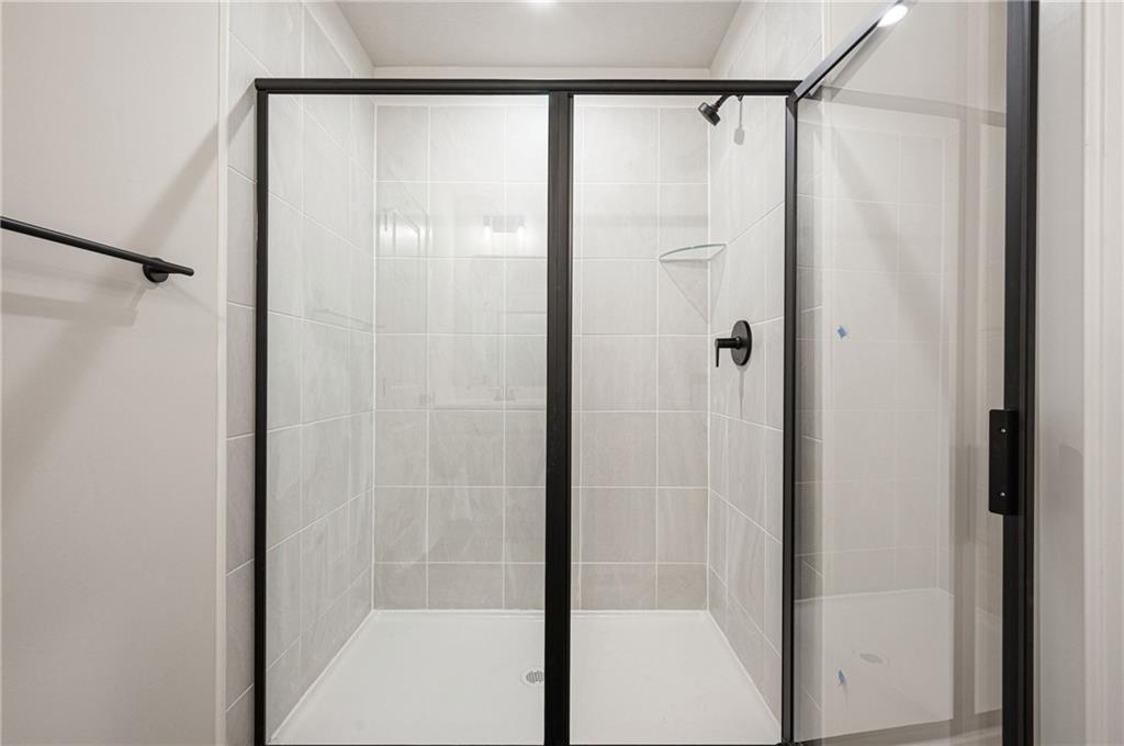 110 Scenic Ridge Drive Venetia, PA 15367 - Photo 31 of 33 a bathroom with a glass shower door